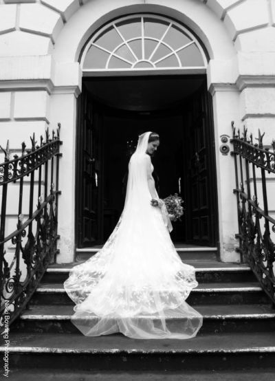 Bride on steps outside Mansion House